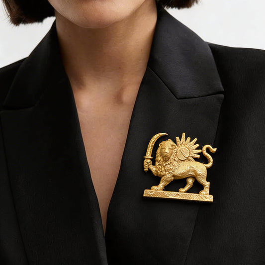Gold 3D printed Lion and Sun brooch pinned on a black suit lapel, representing the historical Shir o Khorshid symbol of Iran